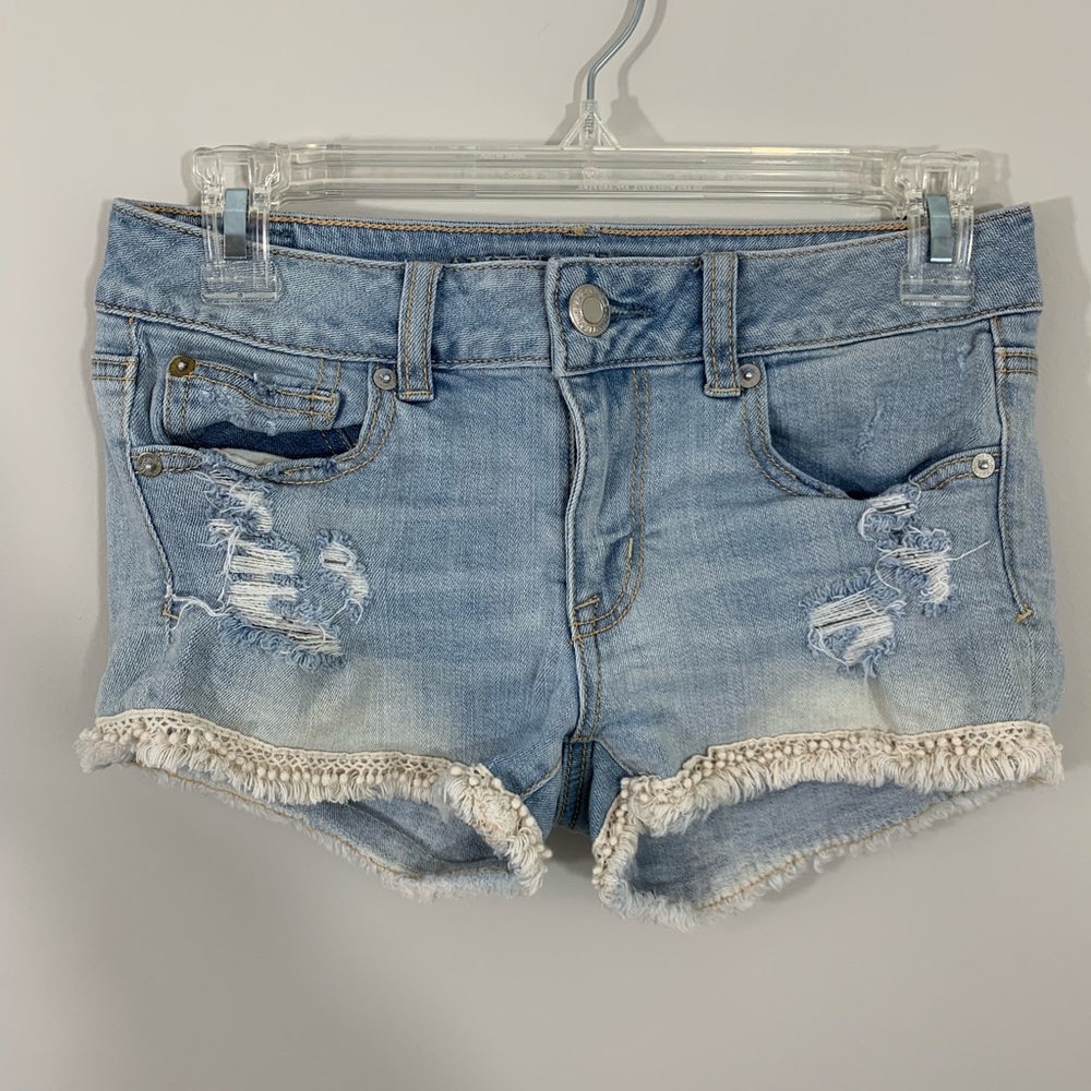 American eagle tassel trim distressed shorties